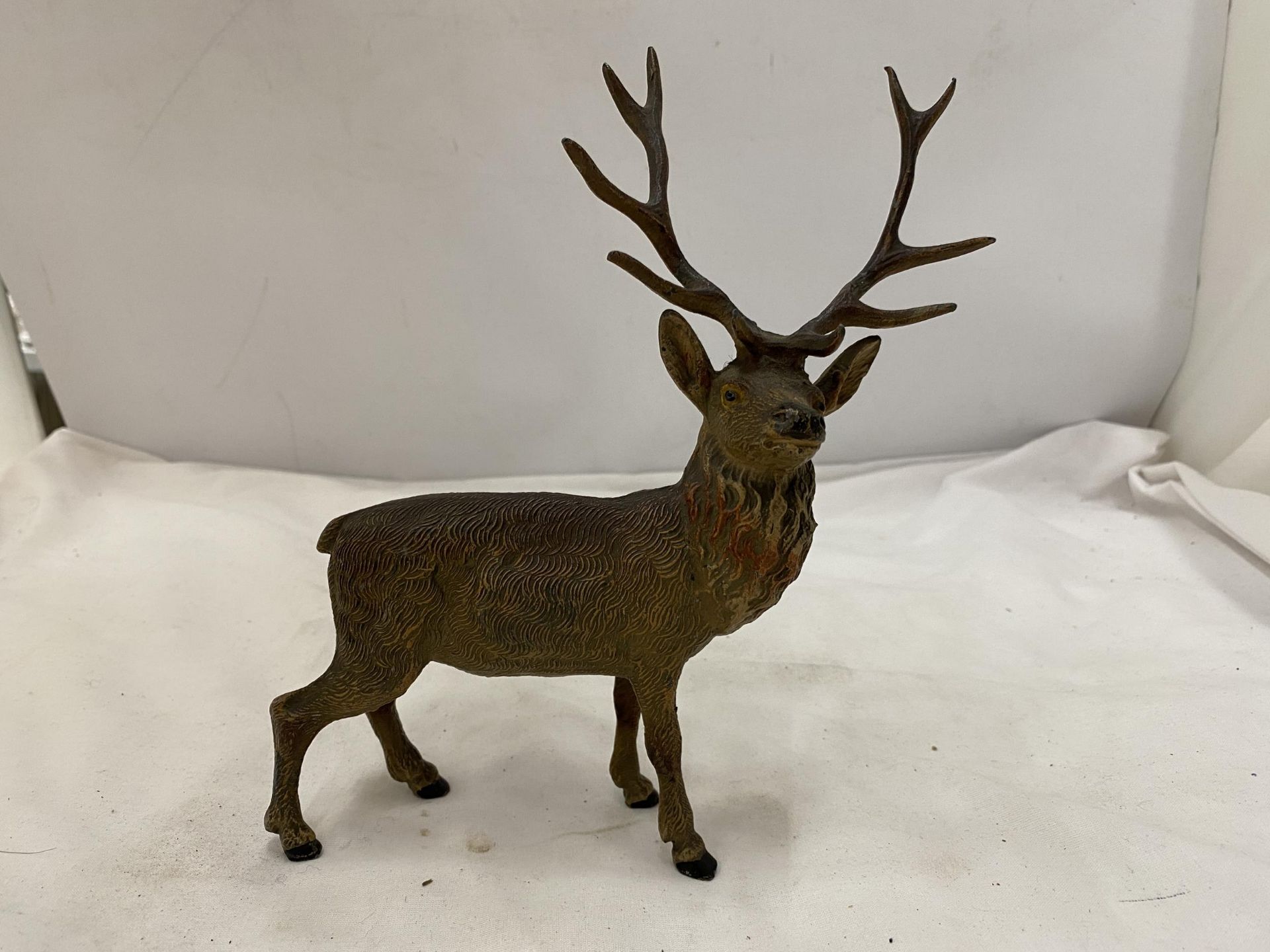 A GOLD PAINTED AUSTRIAN STAG FIGURE