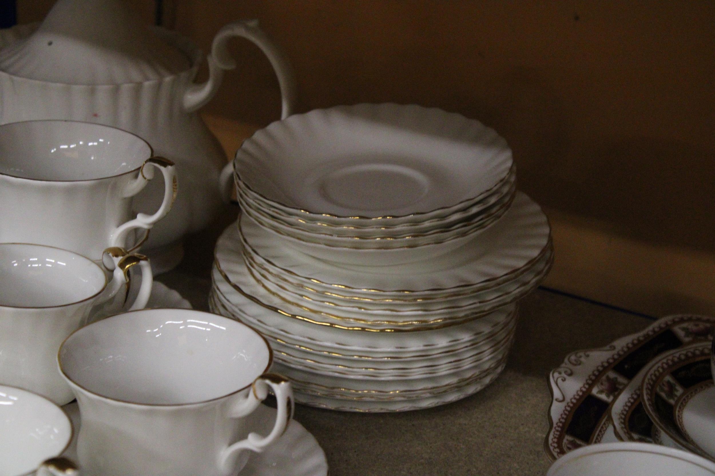 A ROYAL ALBERT "VAL DOR" EMPIRE WHITE, GOLD DECOR TEA SET TO INCLUDE CUPS, SAUCERS, SIDEPLATES, - Image 2 of 6