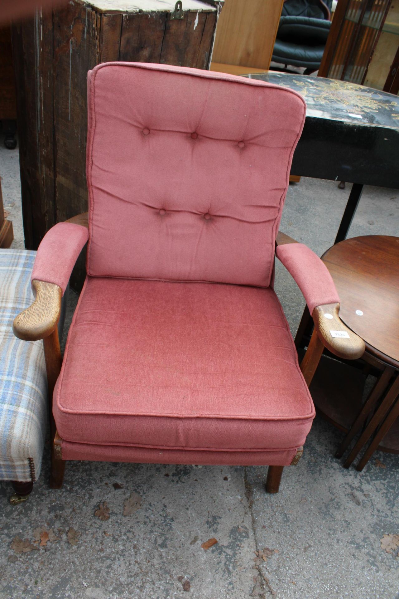 A PARKER KNOLL FIRESIDE CHAIR, MODEL NO. P.K.726