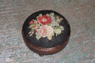 A VICTORIAN MAHOGANY FOOTSTOOL WITH TAPESTRY TOP