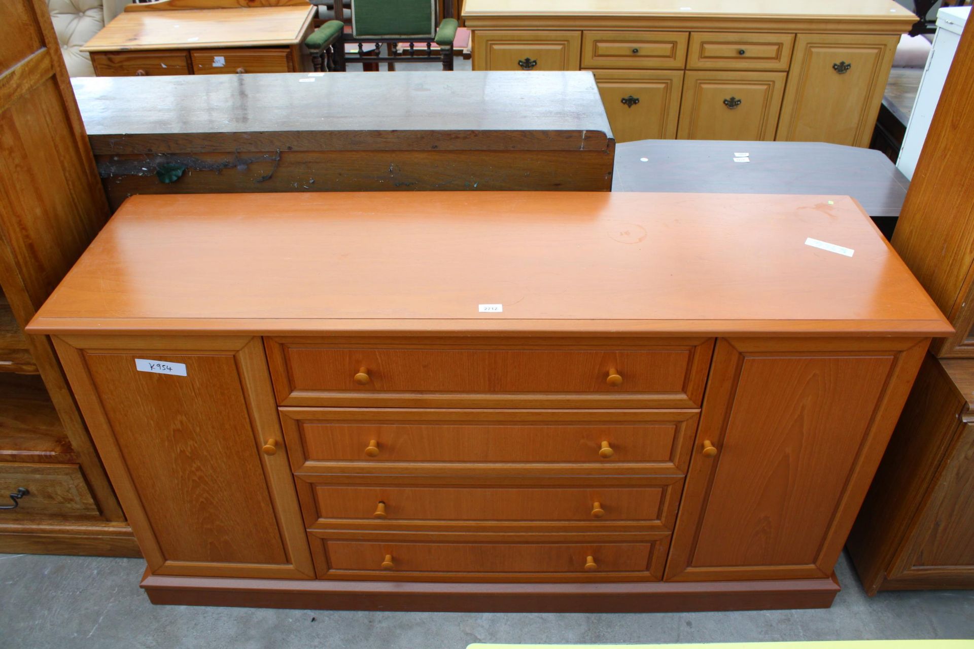 A MODERN G PLAN SIDEBOARD ENCLOSING FOUR DRAWERS AND TWO CUPBOARDS, 61" WIDE