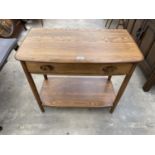A BLONDE ERCOL SIDE TABLE WITH SINGLE DRAWER AND POT BOARD, 31" WIDE