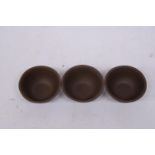 A SET OF THREE CHINESE YIXING STYLE CLAY TEA BOWLS, DIAMETER 6CM