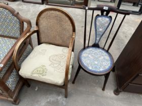 AN EDWARDIAN BEDROOM CHAIR AND A CANE BACK CHAIR