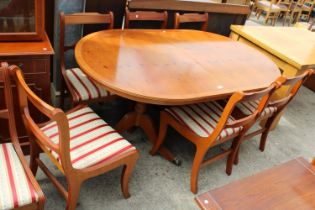 A YEW WOOD REGENCY STYLE EXTENDING PEDESTAL DINING TABLE (62" x 39") (LEAF 22") WITH EIGHT CHAIRS