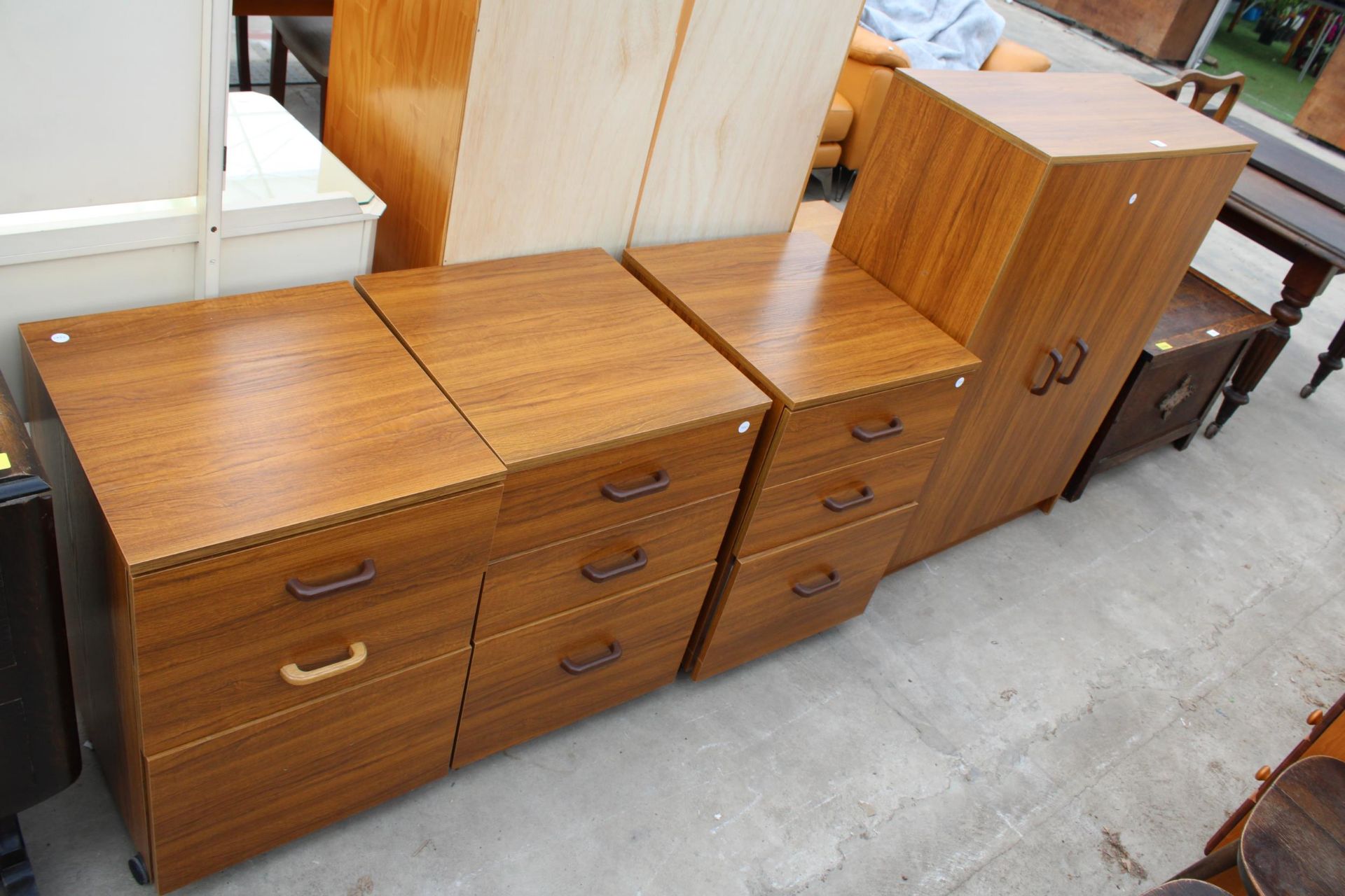 THREE MODERN MATCHING THREE DRAWER CHESTS AND TWO DOOR CUPBOARD