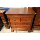 A SIMON HORN NURSERY COLLECTION CHEST OF TWO SHORT, TWO LONG DRAWERS AND A LIFT-UP TOP FOR BABY