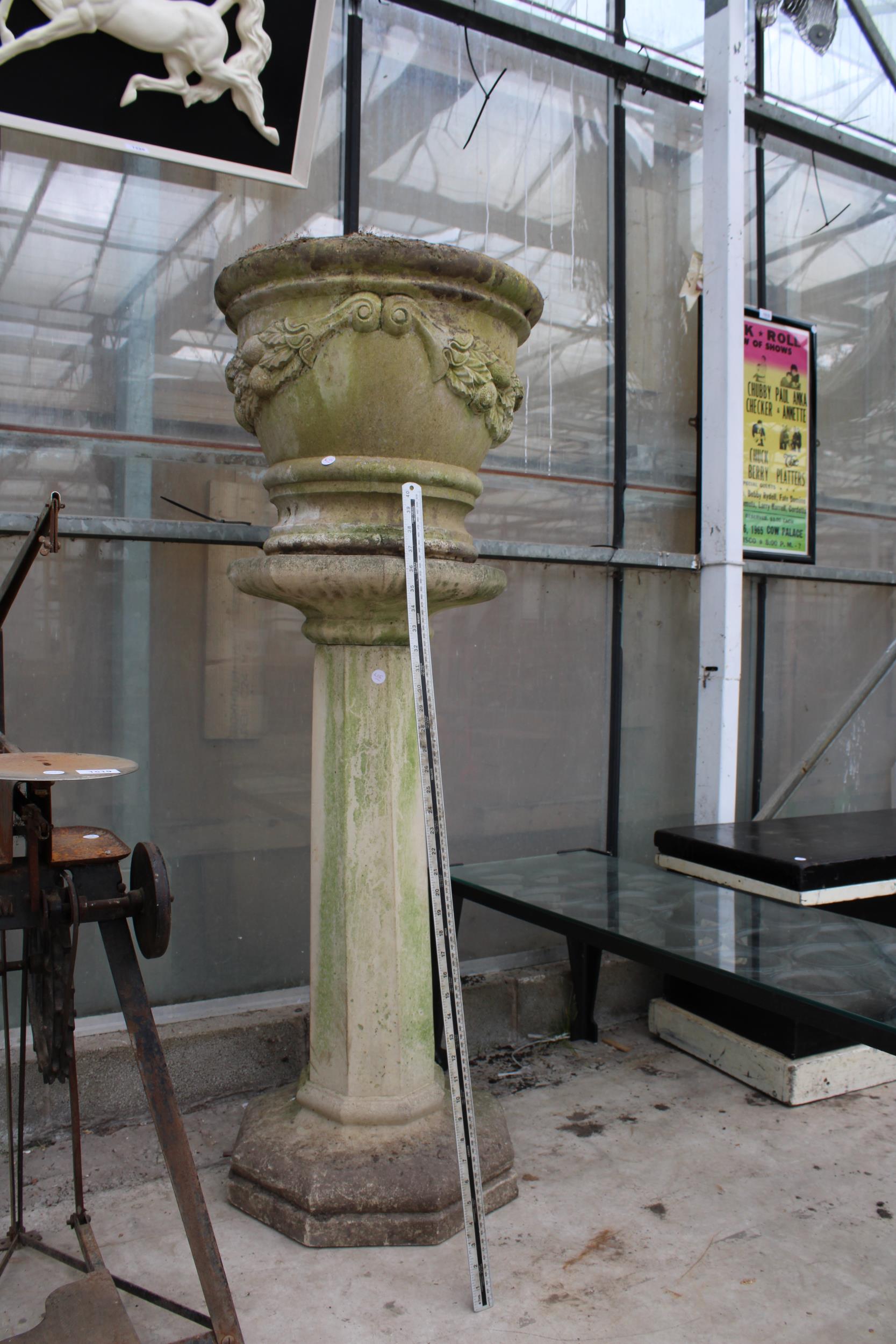 A LARGE RECONSTITUTED STONE PLANTER ON COLUMN PEDESTAL BASE (H:132CM) - Image 2 of 4