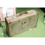 A VINTAGE MILITARY CANVAS TRUNK WITH INITIALS