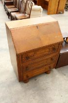 A MID 20TH CENTURY OAK BUREAU - 30" WIDE