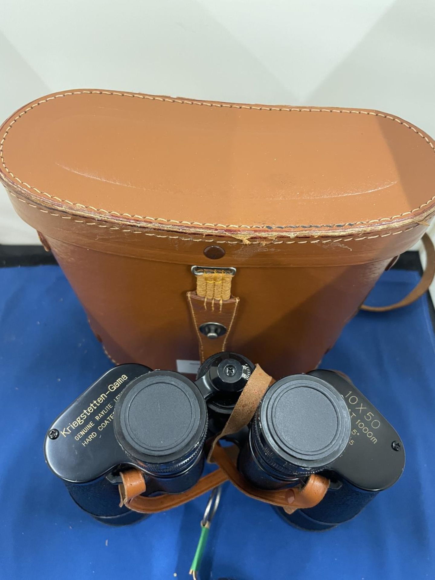 A PAIR OF KRIEGSTETTEN - GAMA BINOCULARS IN A LEATHER CASE WITH A VINTAGE LEATHER TAPE MEASURE - Image 3 of 8