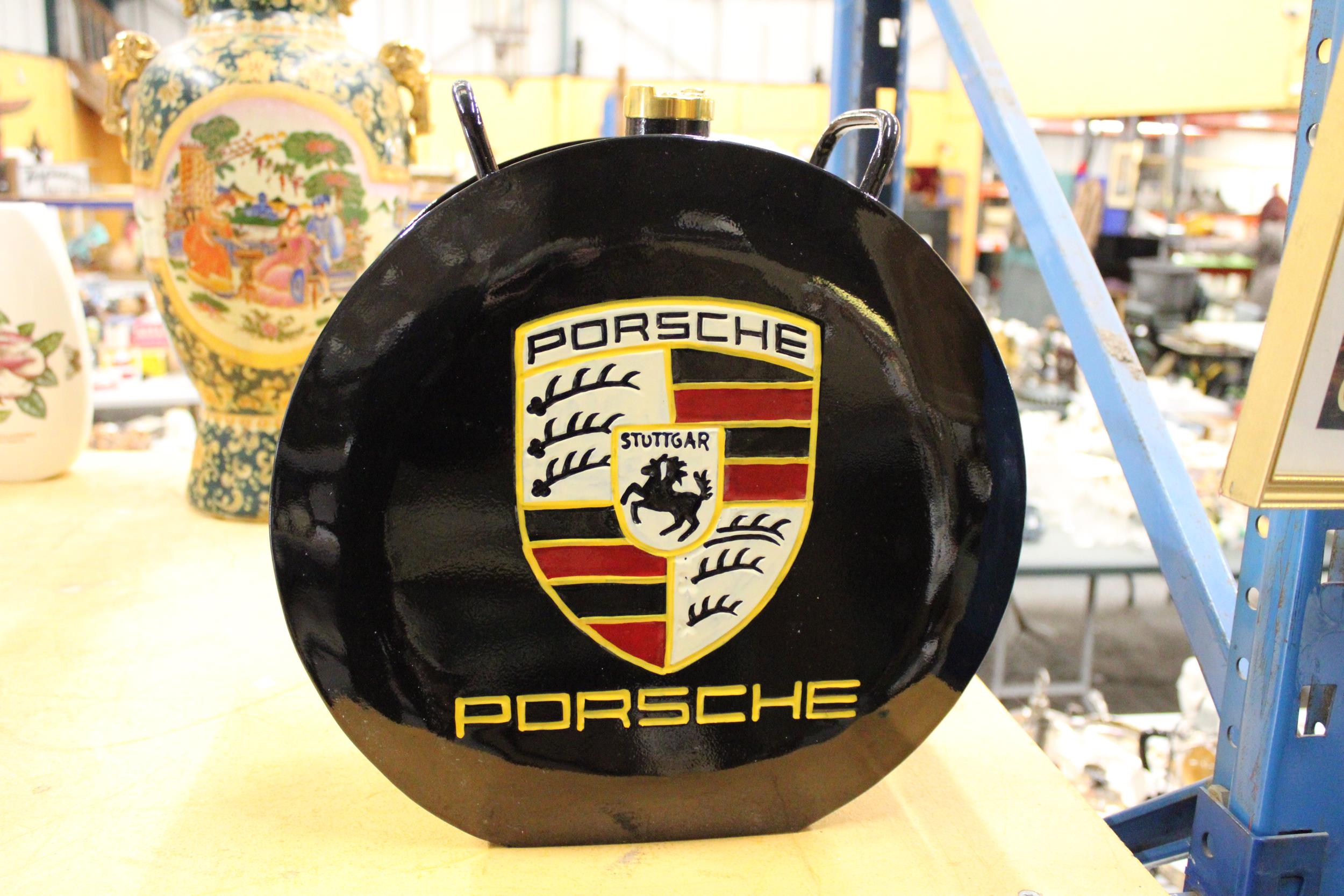 A BLACK PORSCHE PETROL CAN