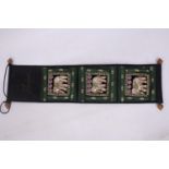 A VINTAGE THAI FABRIC WALL HANGING THREE POCKET ORGANIZER WITH ELEPHANT DECORATION