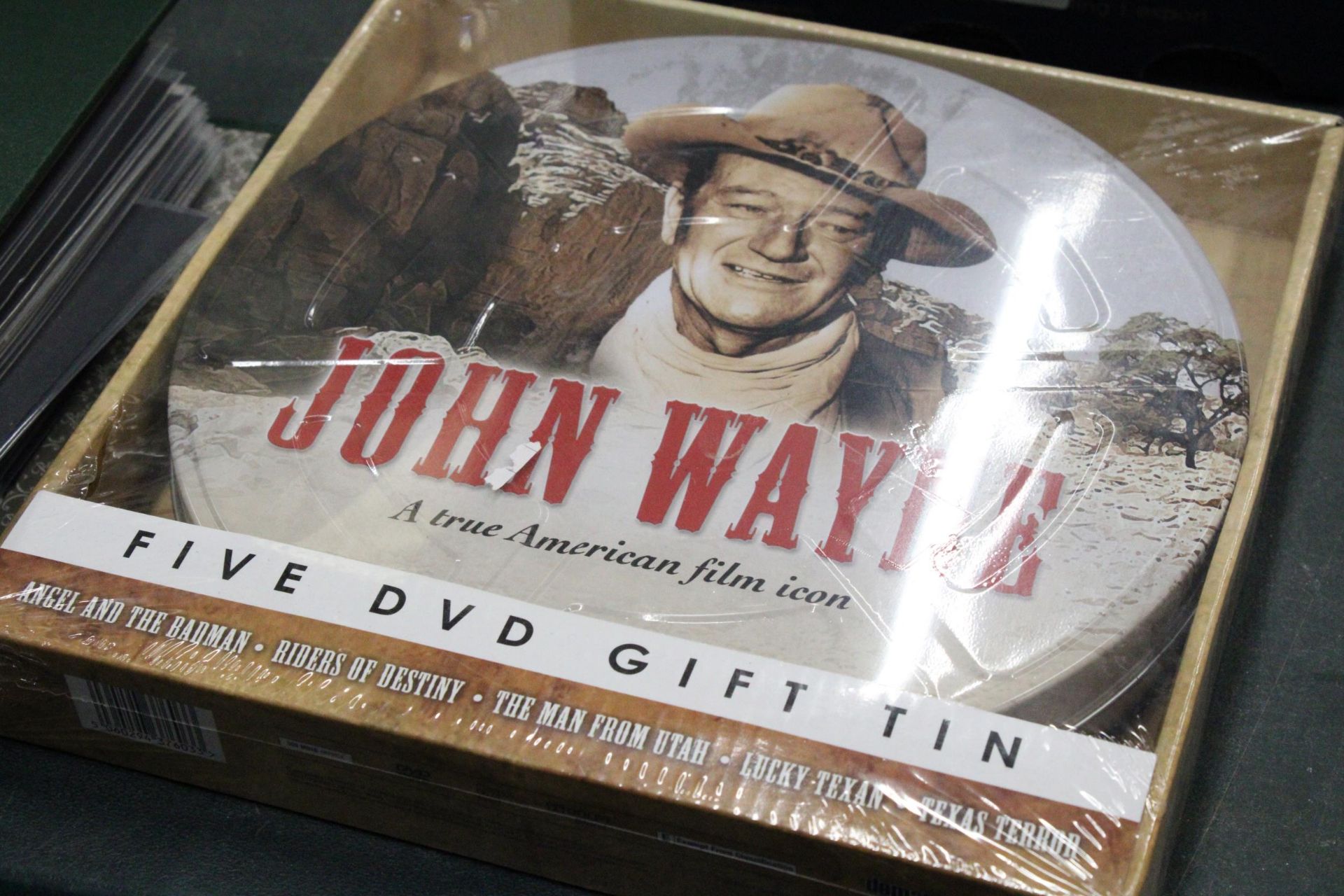 A NEW AND SEALED SET OF FIVE JOHN WAYNE DVD'S IN A METAL GIFT TIN - Image 2 of 4