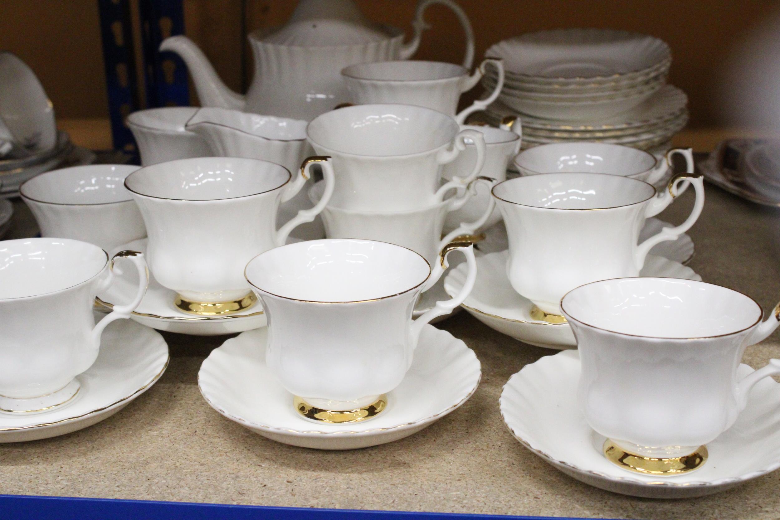 A ROYAL ALBERT "VAL DOR" EMPIRE WHITE, GOLD DECOR TEA SET TO INCLUDE CUPS, SAUCERS, SIDEPLATES, - Image 5 of 6