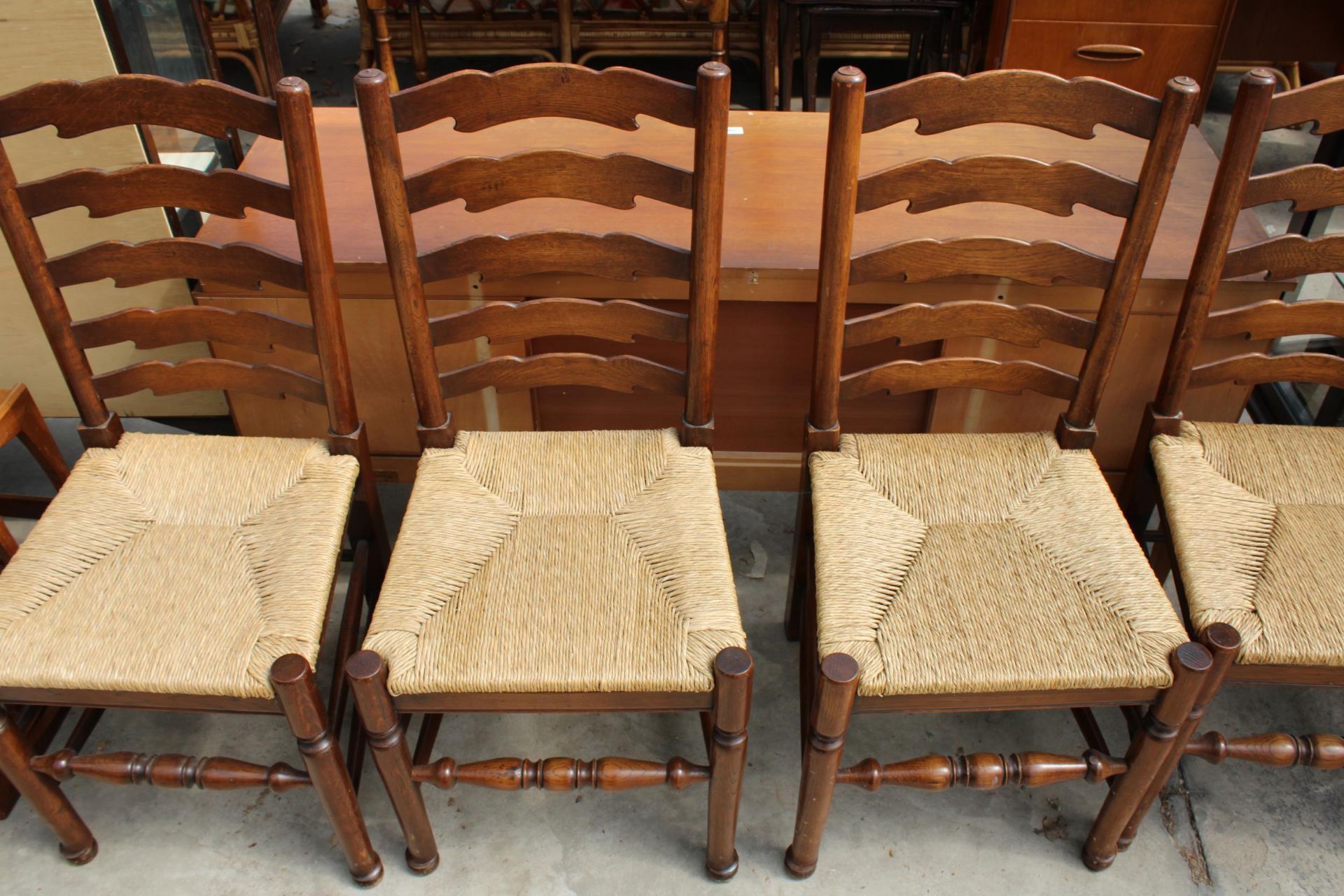A SET OF FIVE ELM AND BEECH LANCASHIRE STYLE DINING CHAIRS WITH LADDER-BACKS AND RUSH SEATS - Image 3 of 3
