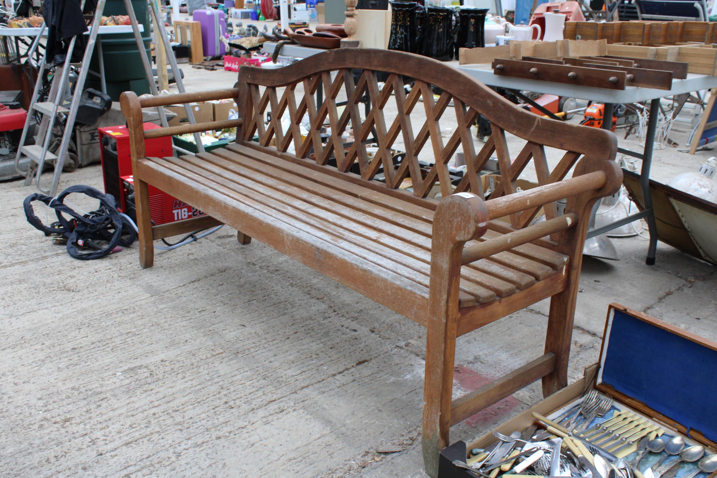 A LARGE WOODEN SLATTED THREE SEATER GARDEN BENCH - Image 2 of 2