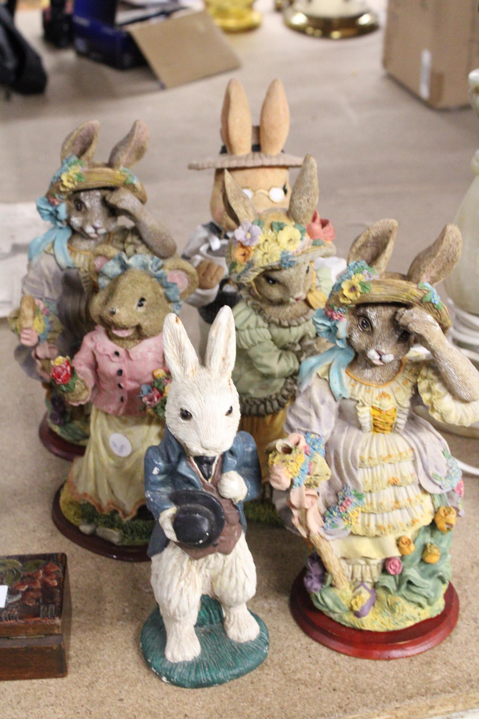 SIX LARGE RABBIT FIGURES PLUS A MOUSE