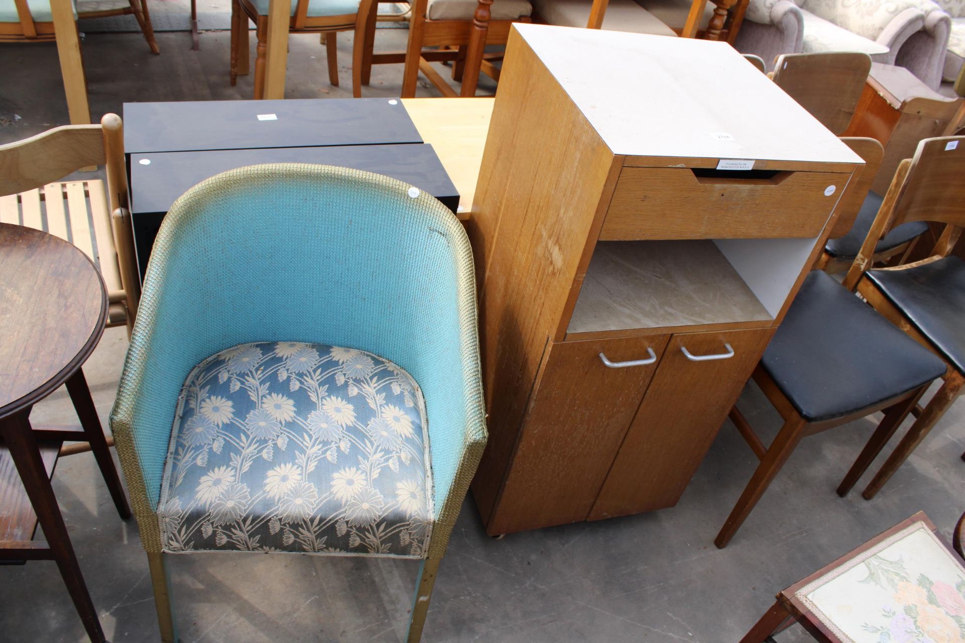 AN OAK AND MELAMINE DAVID BAKER HOSPITAL CABINET AND LLOYD LOOM STYLE CHAIR