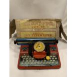 A 1950'S METTYPE JUNIOR TIN TOY TYPEWRITER IN ORIGINAL BOX