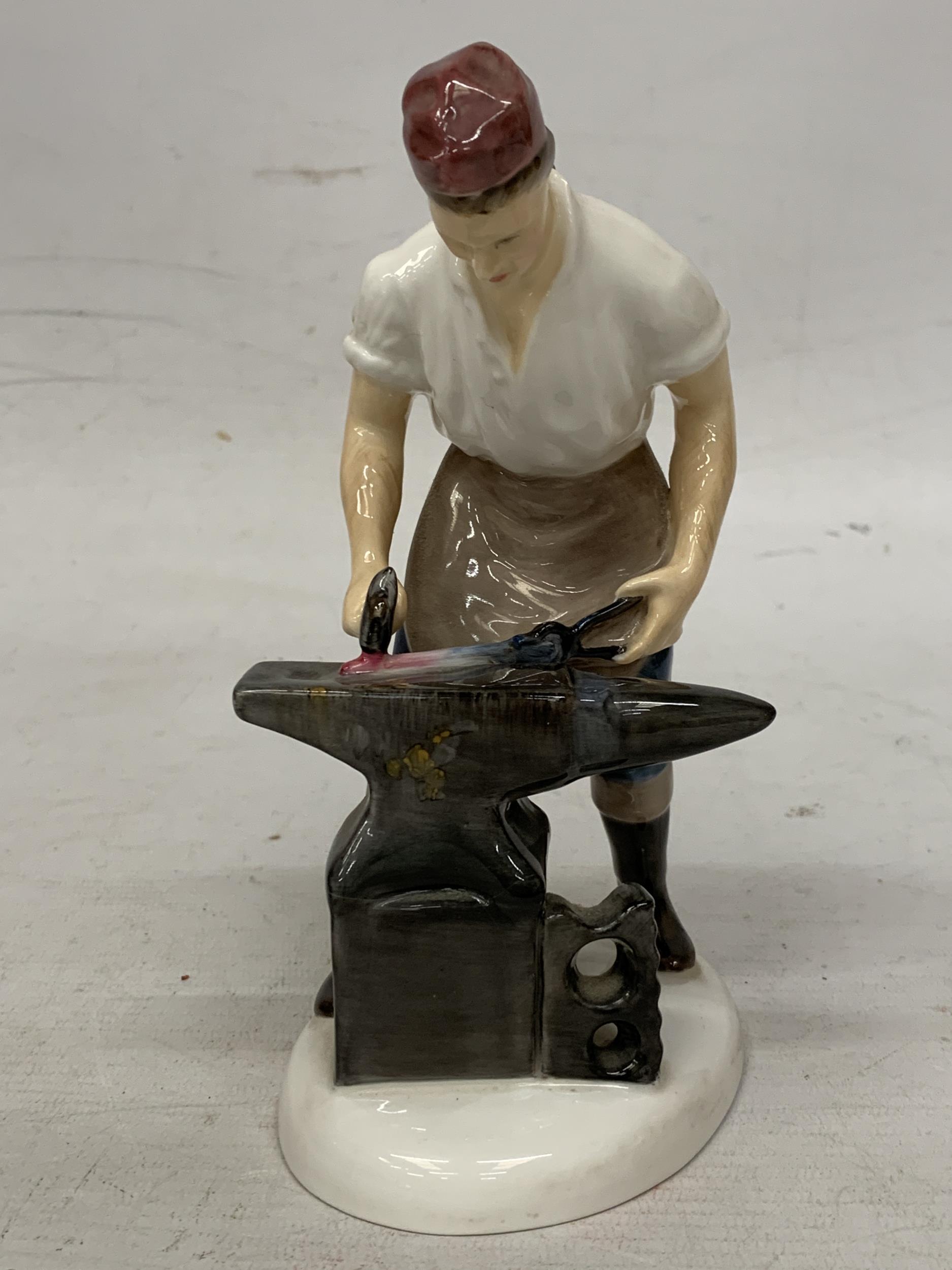 A ROYAL DOULTON FIGURE "THE BLACKSMITH OF WILLIAMSBURY" HN 2240