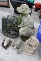 AN ASSORTMENT OF CONCRETE ANIMAL GARDEN FIGURES TO INCLUDE A LABRADOR, A PIG AND A DUCK ETC