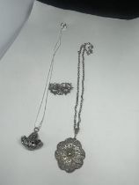 TWO SILVER NECKLACES AND A SILVER BROOCH