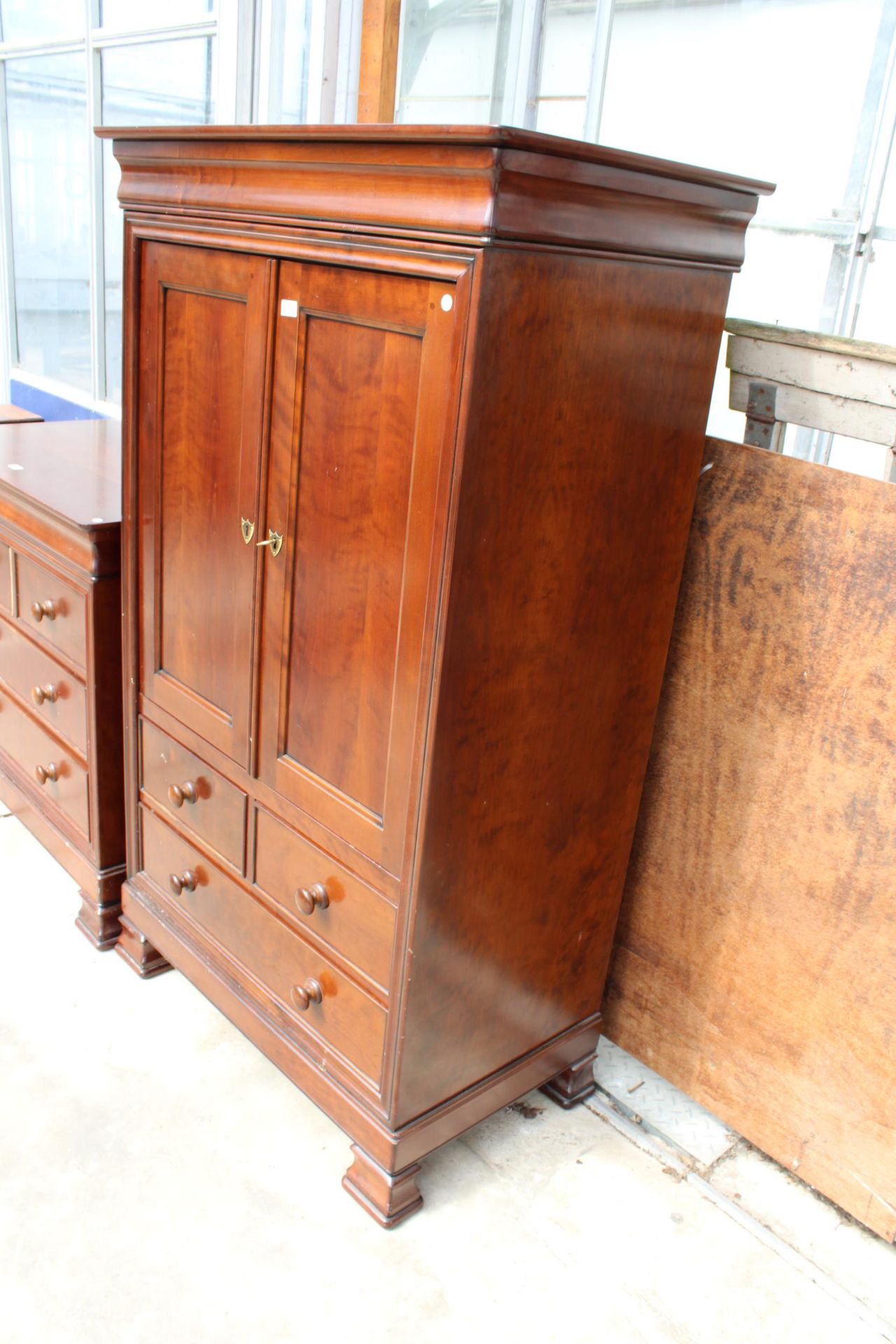 A SIMON HORN NURSERY COLLECTION PRESS STYLE TWO DOOR CUPBOARD WITH TWO SHORT AND TWO LONG DRAWERS TO - Image 2 of 4