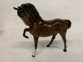 A BOXED ROYAL DOULTON FIGURE OF A PRANCING STALLION