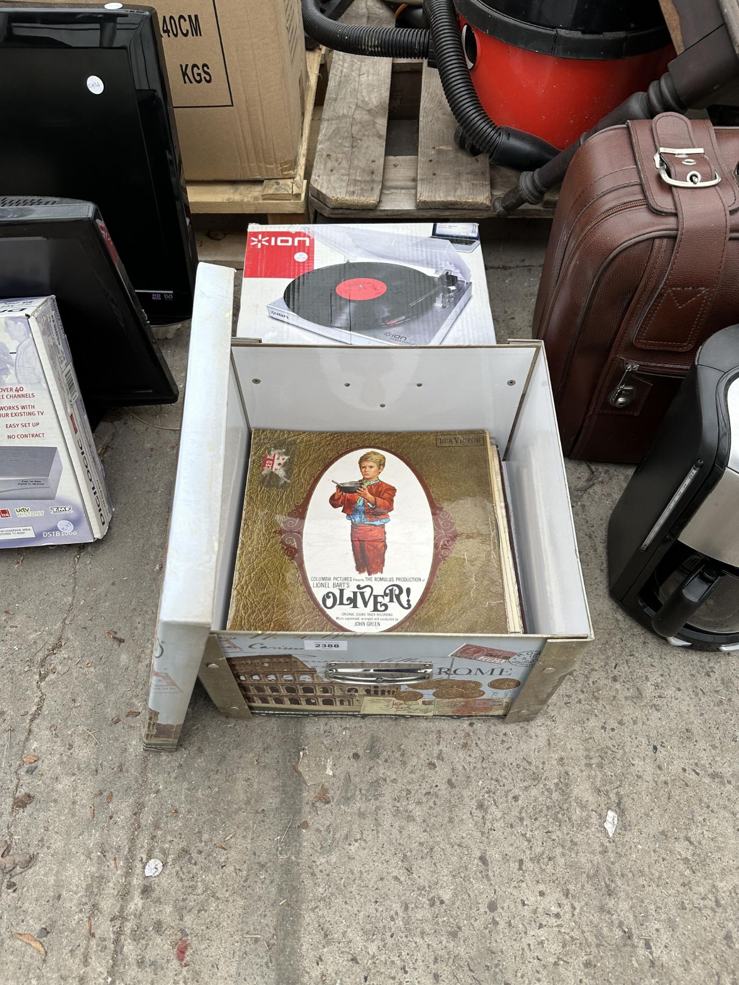 AN ION RECORD PLAYER AND AN ASSORTMENT OF LP RECORDS