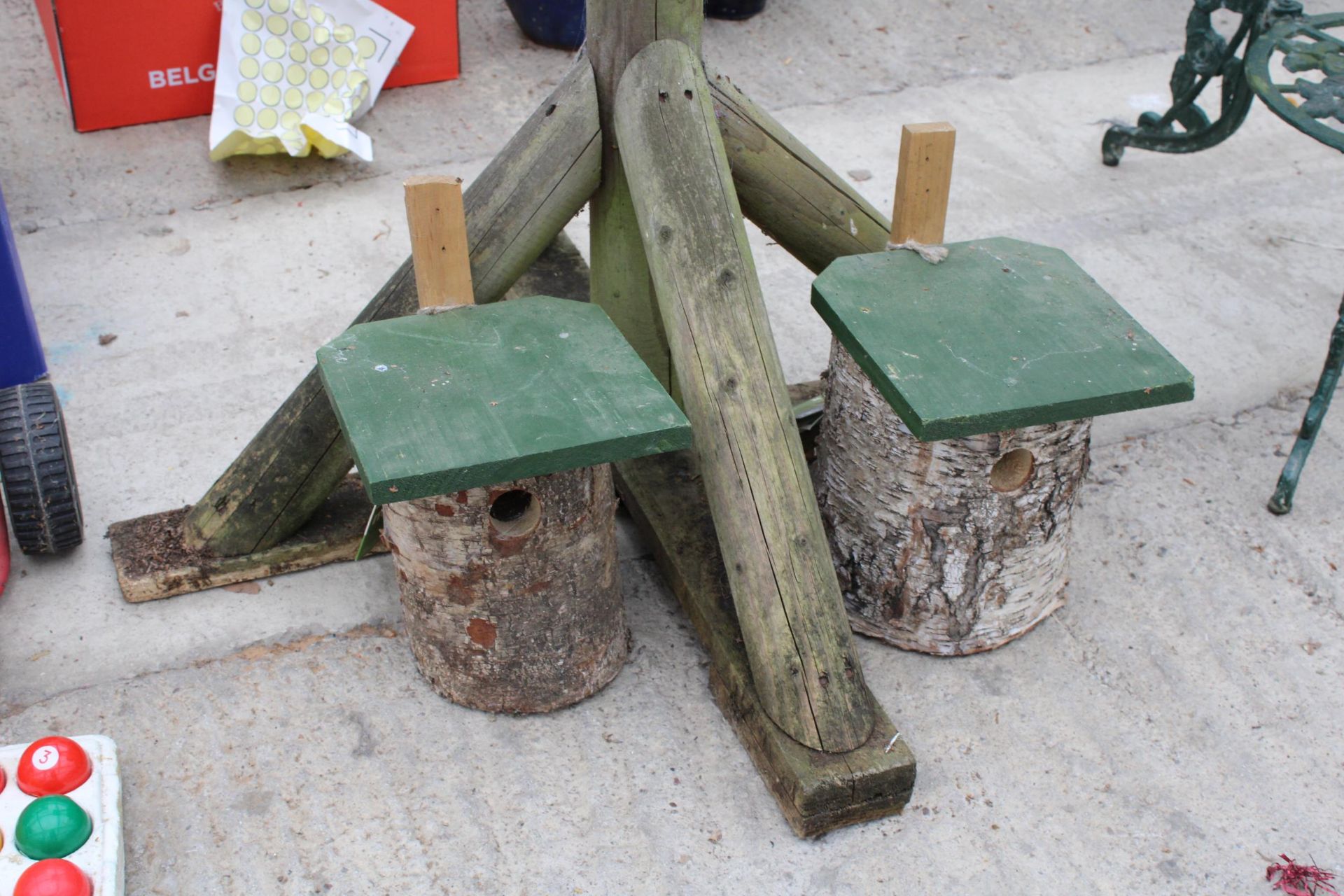A WOODEN BIRD TABLE AND TWO LOG BIRD BOXES - Image 3 of 3
