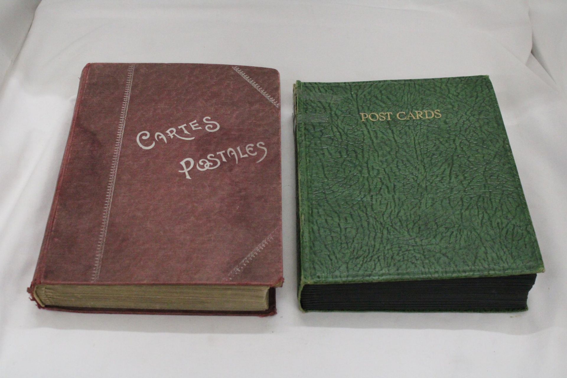 TWO POSTCARD ALBUMS INCLUDING YORK, WARWICK CASTLE ETC