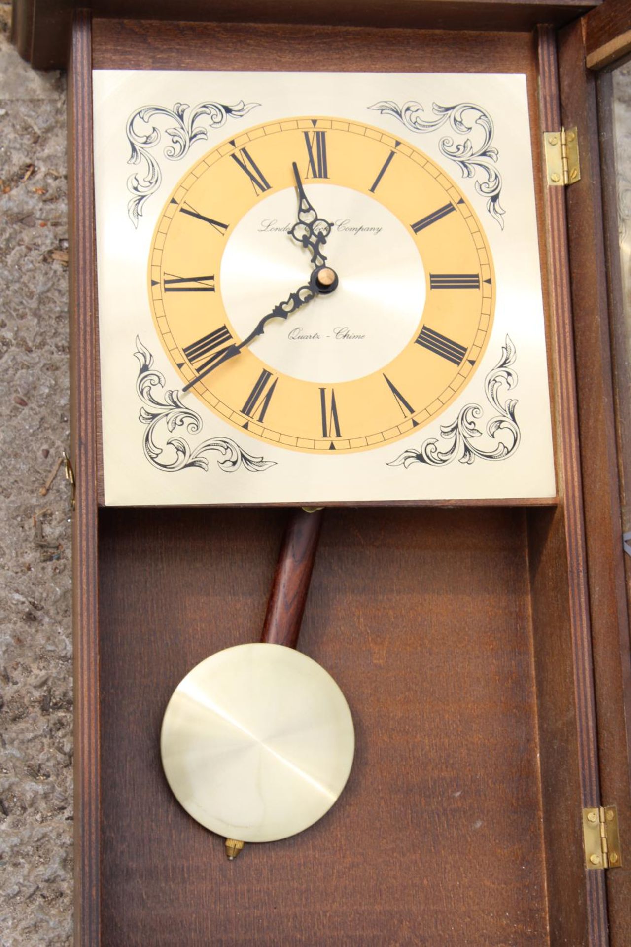 A WOODEN CASED QUARTZ WALL CLOCK - Image 2 of 2