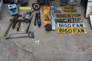AN ASSORTMENT OF HAND TOOLS AND VINTAGE CAR NUMBER PLATES ETC