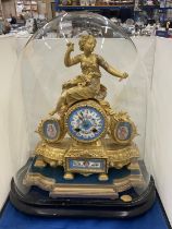 A VINTAGE FRENCH ORMOLU CLOCK WITH DECORATIVE ENAMEL FACE AND PANELS IN A GLASS DOME (A/F)