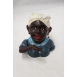 A VINTAGE CAST IRON AFRICAN AMERICAN MECHANICAL BANK