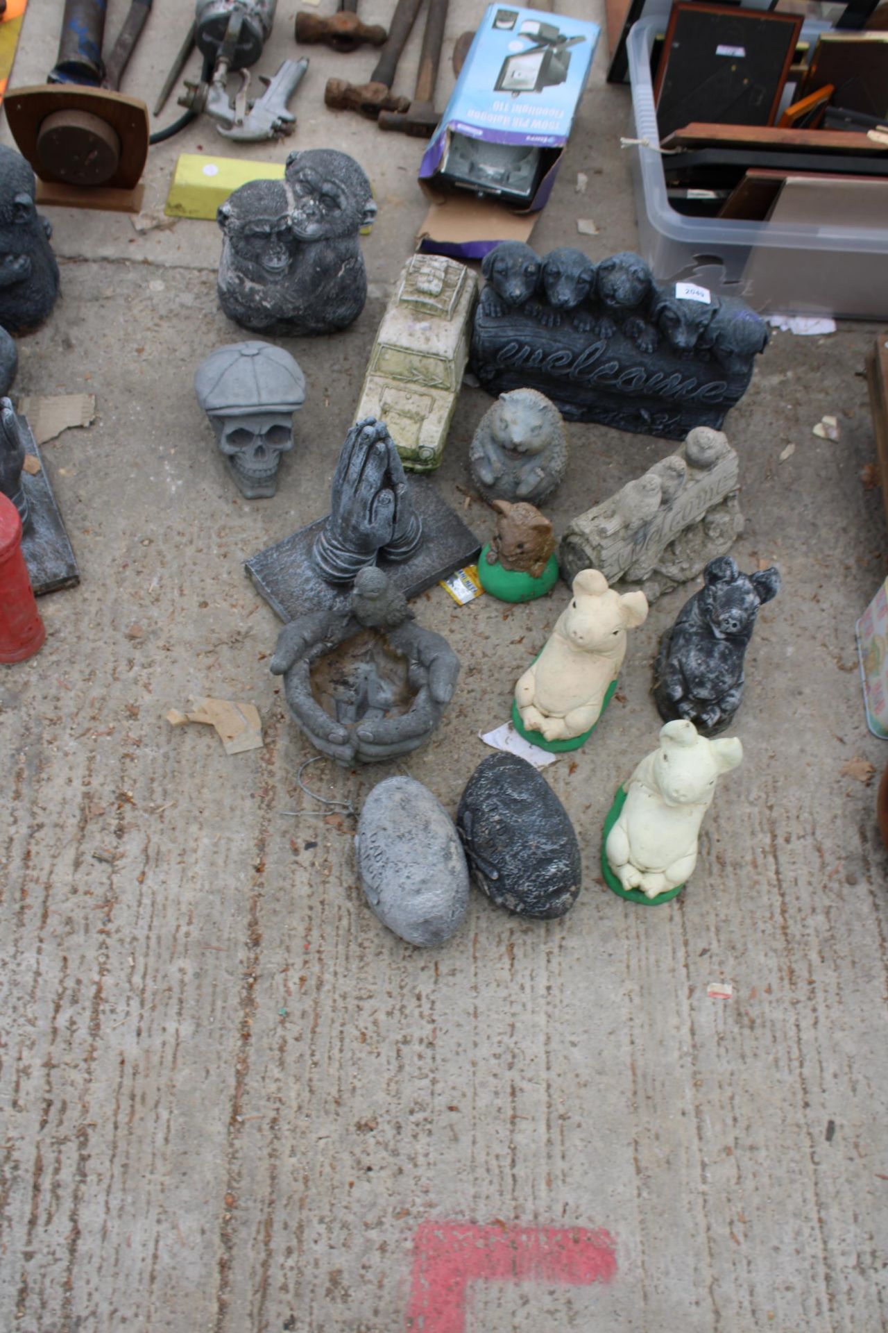 FOURTEEN CONCRETE GARDEN FIGURES TO INCLUDE PIGS, A VAN AND MONKIES ETC