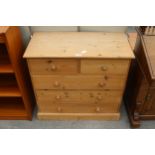 A PINE CHEST OF TWO SHORT AND THREE LONG DRAWERS, 31" WIDE