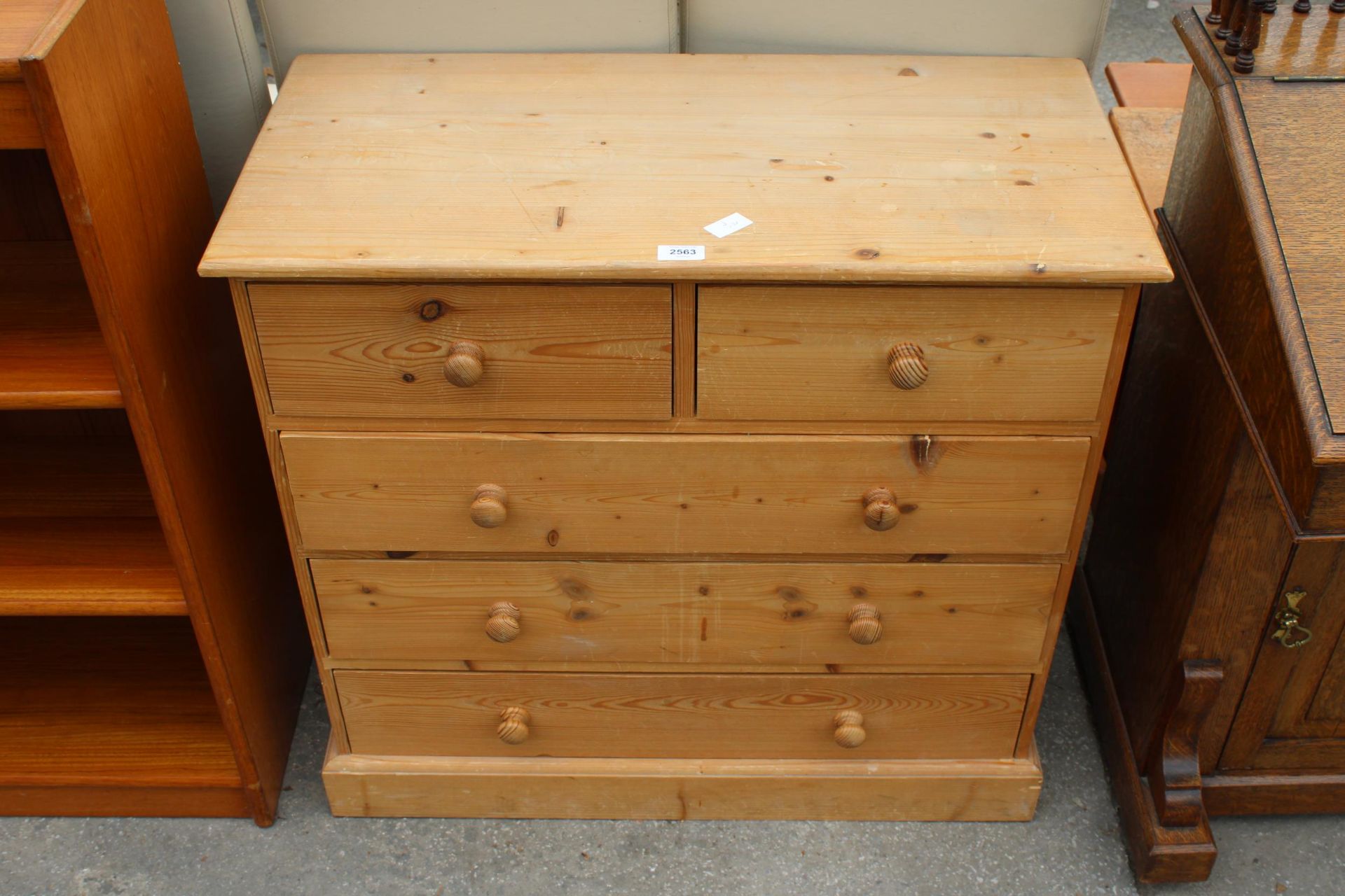 A PINE CHEST OF TWO SHORT AND THREE LONG DRAWERS, 31" WIDE
