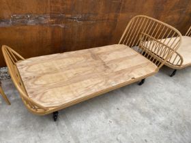 AN ERCOL BLUE LABEL BLONDE 3'6" WINDSOR STYLE BED