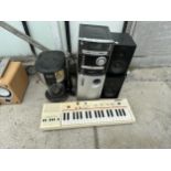 AN ASSORTMENT OF ITEMS TO INCLUDE SPEAKERS, A KEYBOARD AND A COFFEE MAKER ETC