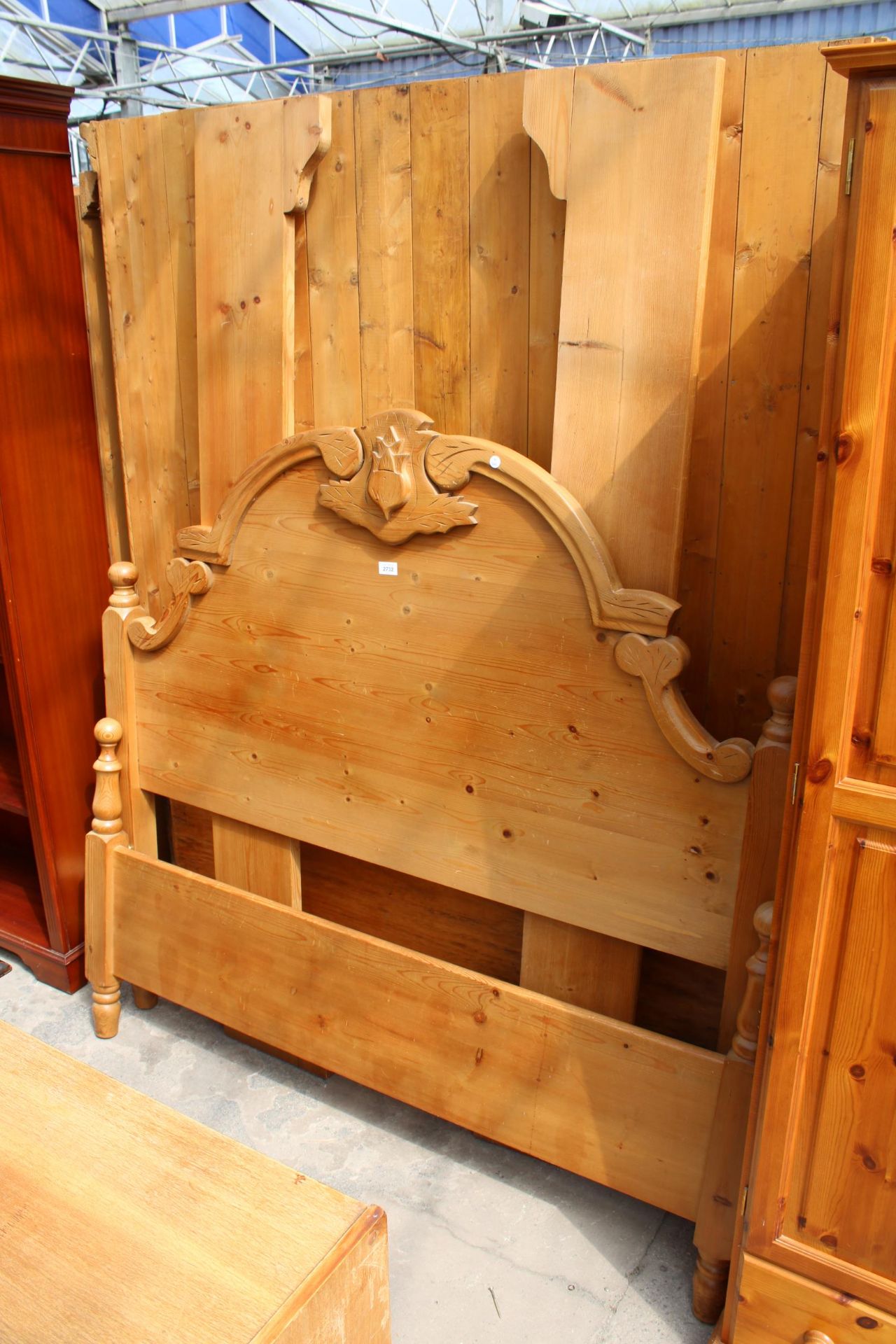 A VICTORIAN STYLE PINE 4'6" BEDSTEAD