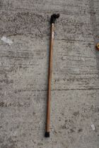 A VINTAGE WOODEN WALKING STICK WITH DOG HEAD HANDLE