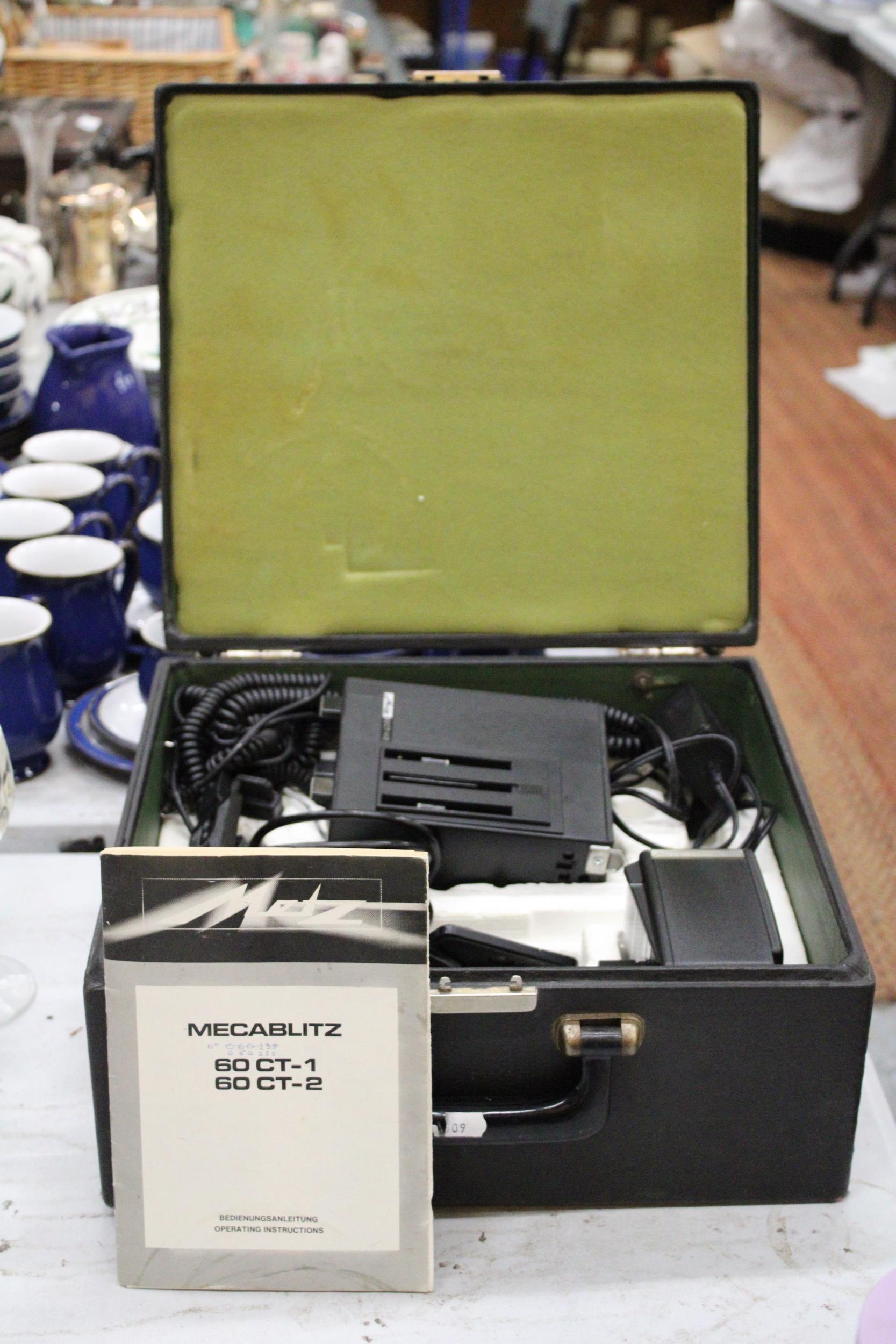 A VINTAGE 'MECABLITZ' 60 CT 2 FLASH UNIT WITH ACCESSORIES AND OPERATING INSTRUCTIONS, IN ORIGINAL