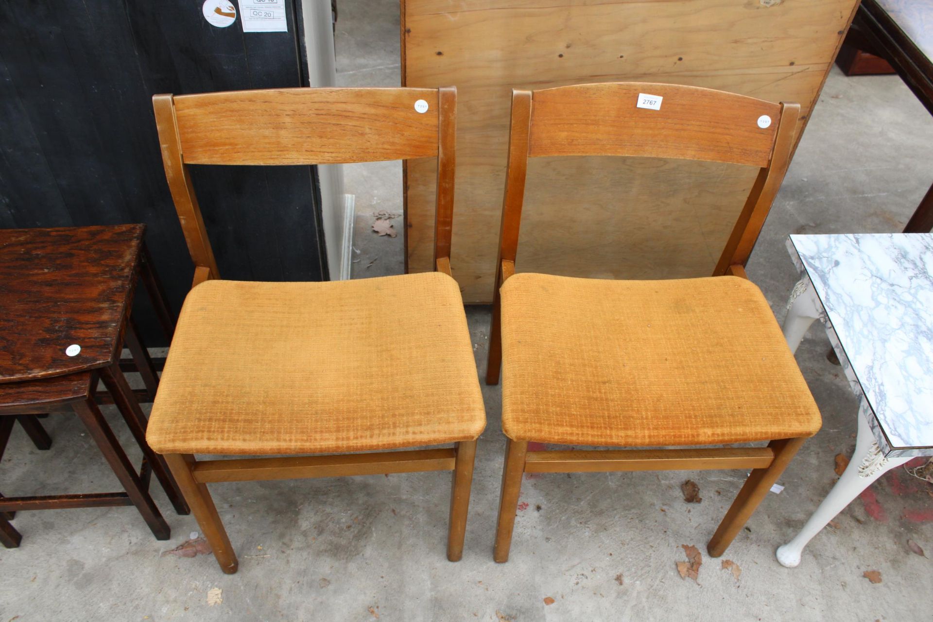 A PAIR OF RETRO TEAK DINING CHAIRS