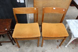 A PAIR OF RETRO TEAK DINING CHAIRS