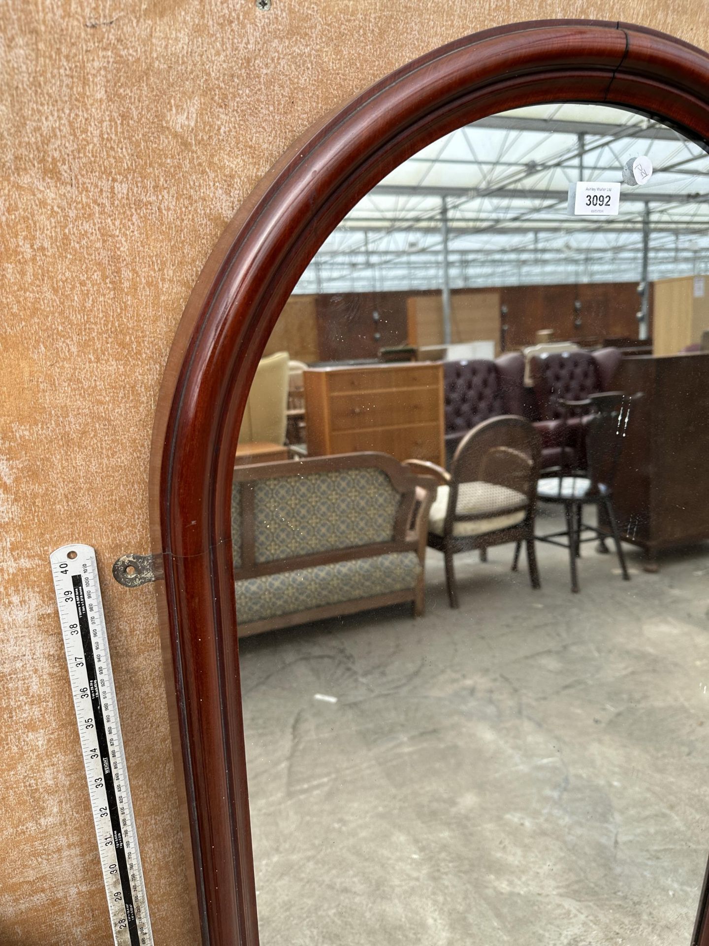 AN ARCHED MAHOGANY MIRROR - Image 2 of 2