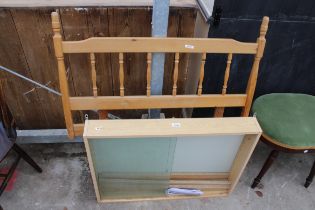 A SINGLE PINE DIVAN HEADBOARD AND WALL DISPLAY CASE