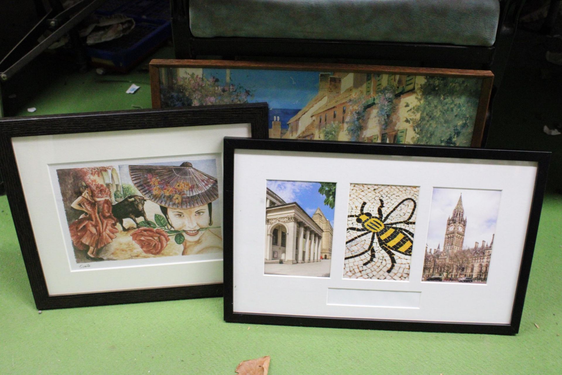 THREE FRAMED PRINTS TO INCLUDE PHOTOGRAPHS OF MANCHESTER, A SPANISH BULL AND LADY PLUS A