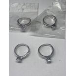 FOUR MARKED S925 RINGS WITH CLEAR STONES
